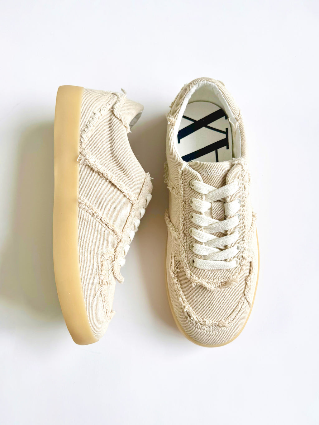 Side view of MayMax Frayed Edge Canvas Sneaker with gum rubber sole