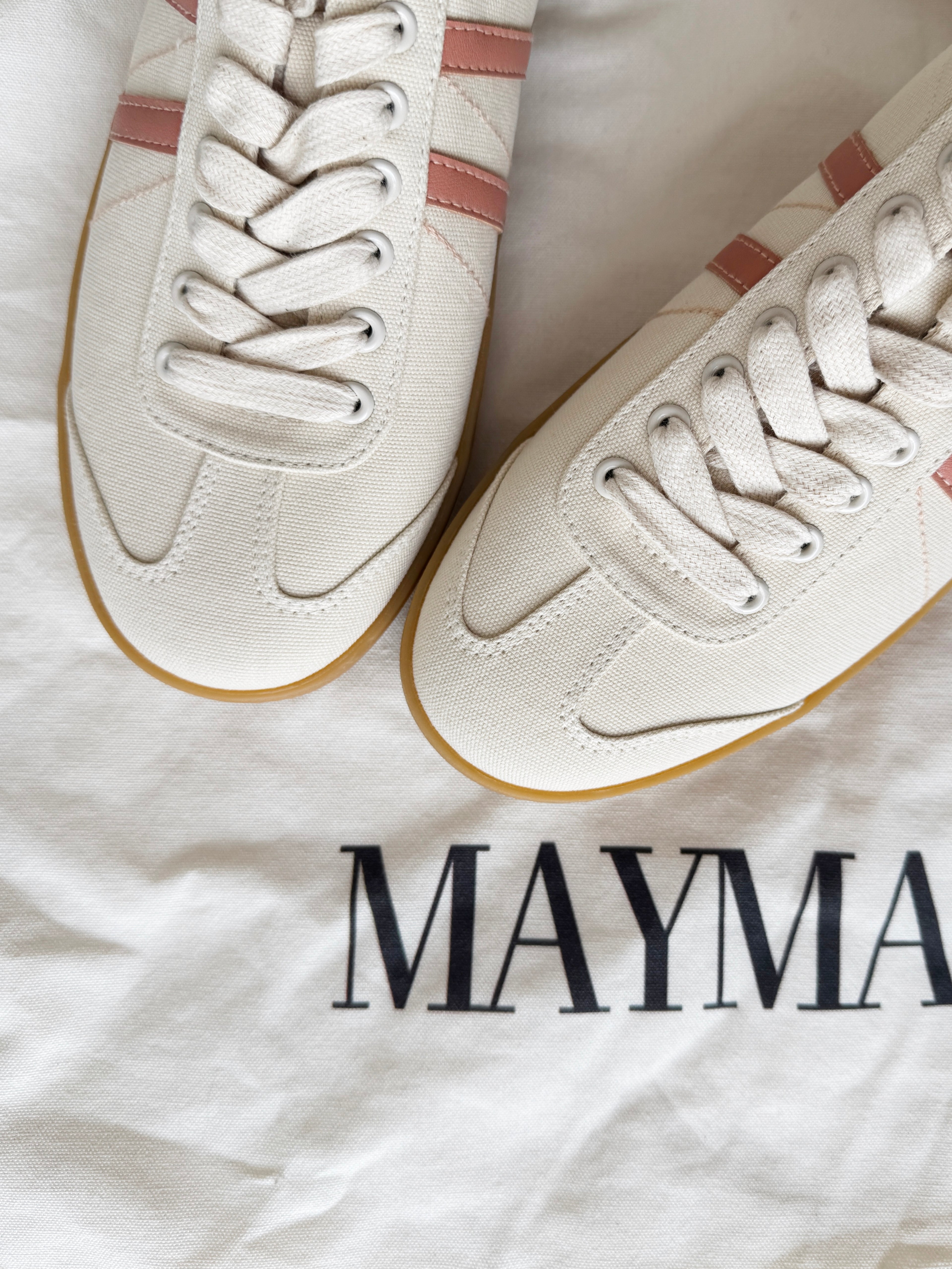 Close-up of MayMax Minimalist Retro Sneaker stripe and lace detail