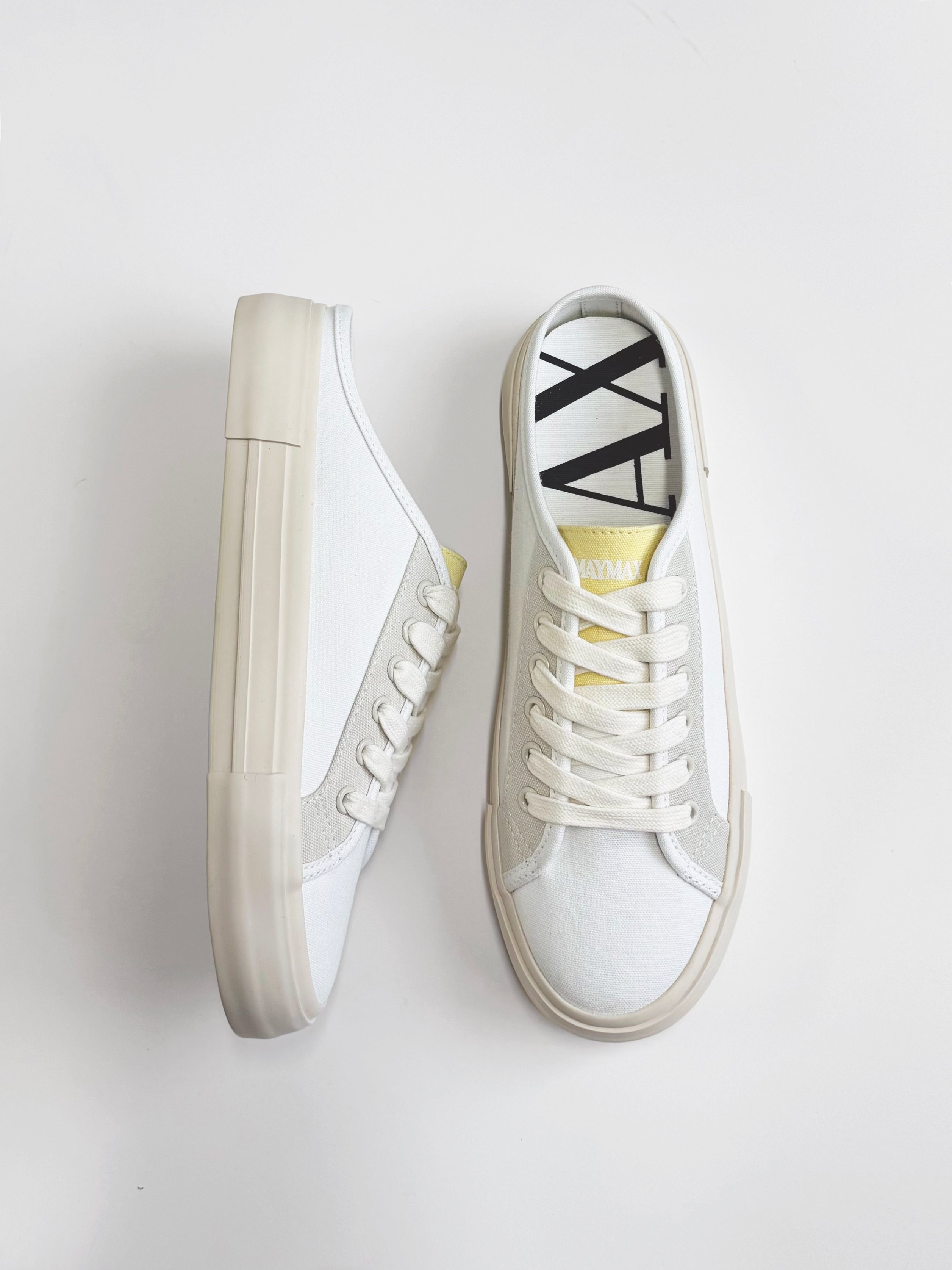 Side view of MayMax White Canvas Mule Sneaker with open heel and rubber sole