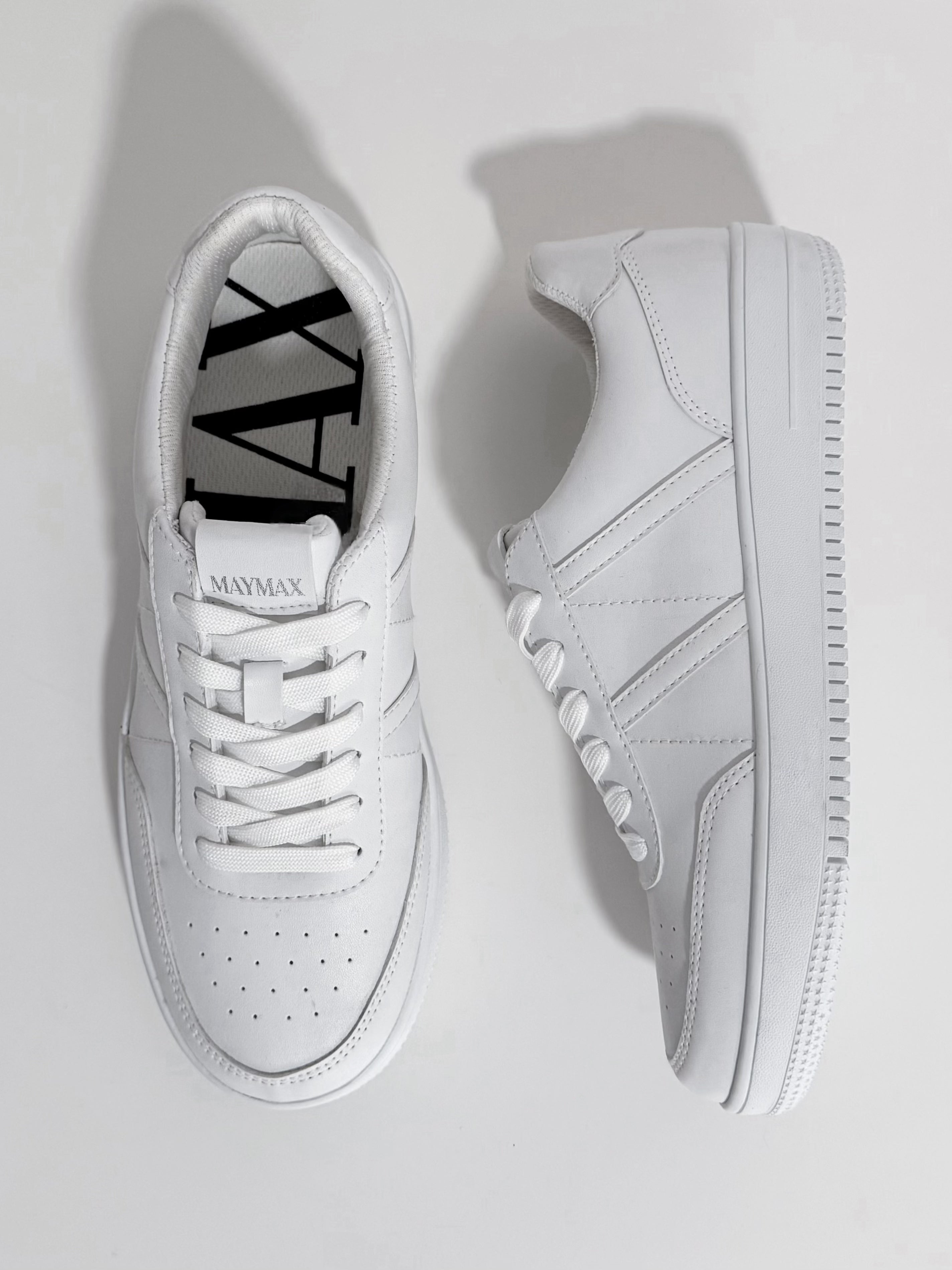 Side view of MayMax Essential White Sneaker with white rubber sole