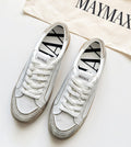 MayMax Distressed White Sneaker in white with grey suede and gum sole — lived-in women's sneaker